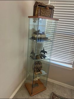 Glass display with lighting stuff inside not including