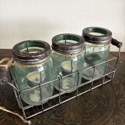 Rustic  jar Flower vases set in a wire basket