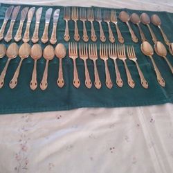  H.F Ltd ( Hanford Forge) Stainless   Golden Color ,Plated Pierced Rose Utensils Set of 35. Woodland Hills Ca. 