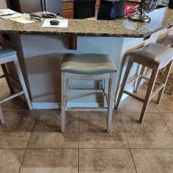 Four 30 inch high bar stools