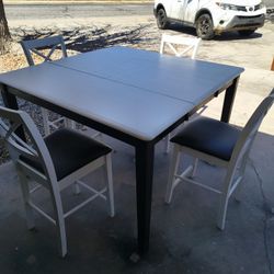 Dinning Table Solid Wood With 4 Chairs Has Leaf To Make Bigger 