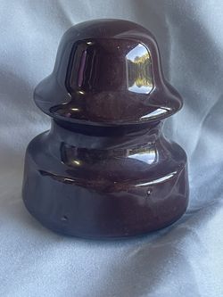Vintage, dark brown glaze insulators