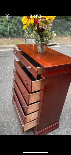 Delivery available. Solid Wood tall chest with big drawers.