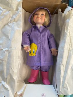 Collectible Girl Doll with Tweety Bird Raincoat