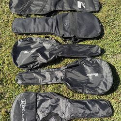 5 used soft guitar cases for $60