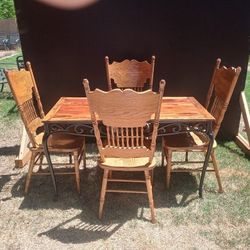 0ak pressed back chairs and table