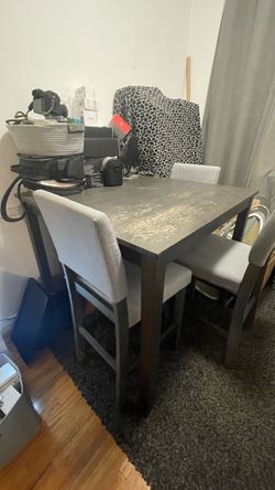High top dining table with 4 matching chairs