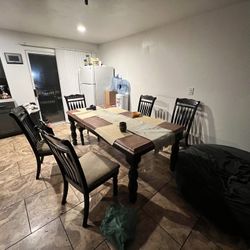 Table + 6 Chairs (price negotiable)