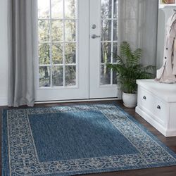 Tayse Veranda 7 x 10 (ft) Flatweave Polypropylene Indigo Rectangular Indoor/Outdoor Border Coastal Spot Clean Only Pet Friendly Area rug $85