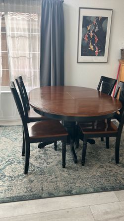 Wood dining table and four chairs