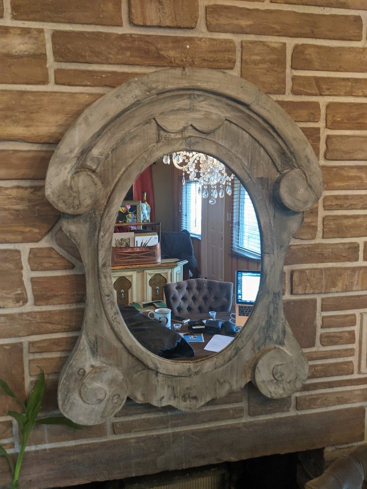 anthropologie weathered curlicue mirror