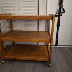 Table with shelves and wheels
