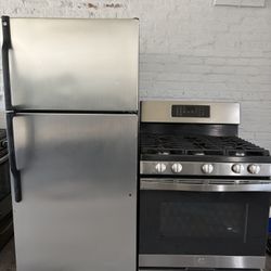 GE top freezer refrigerator &. GE 5 burner gas range set