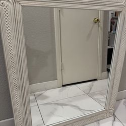 Mirror with wooden frame