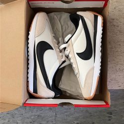 White/Black Nike Pacifics 