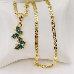 Dije mariposa y Cadena oró laminado/butterfly pendant and 14k gold plated chain