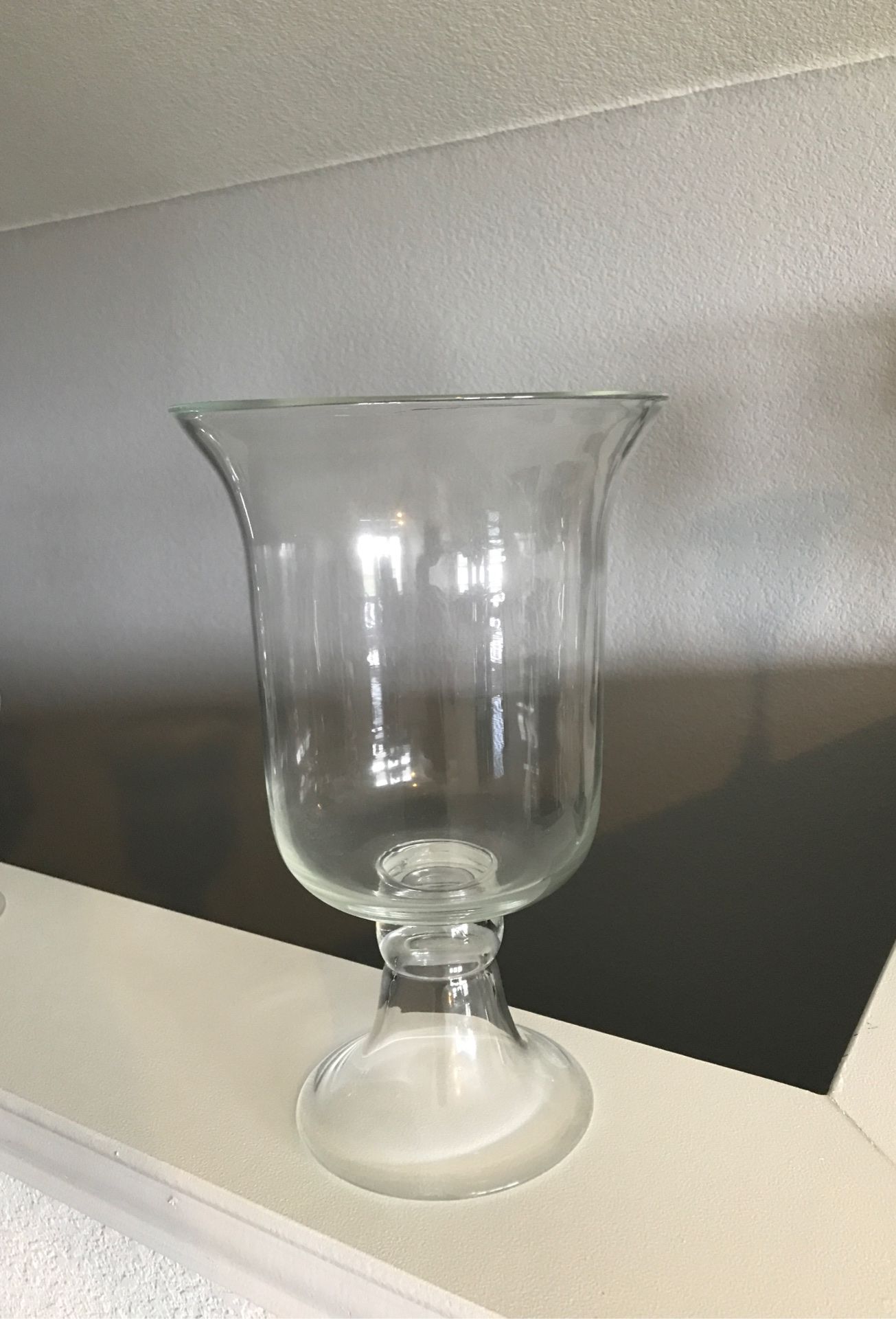 Large glass vase.