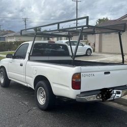 .g.   Customize 2000 Toyota Tacoma Rack Width 56" And  70" Long To Fit On The Bed Edges.