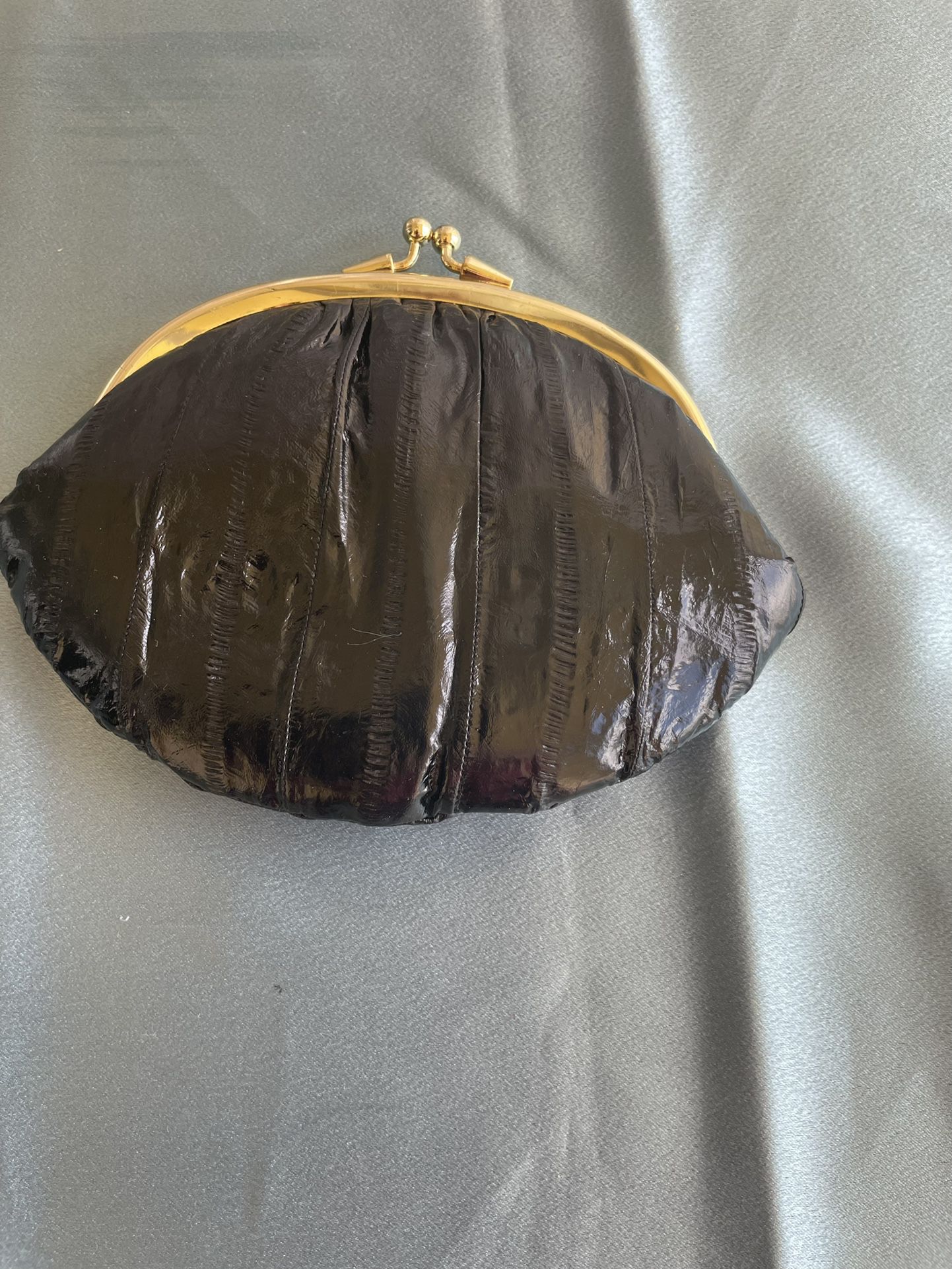 Vintage circa 1970s 1980s genuine eel skin small clutch. Made in Korea.