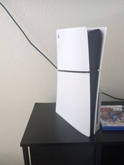 PS5 Slim Bundle with 2 Controllers and 2 Games