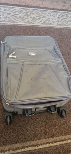Departures carry on suit case