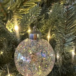 Sm glitter plastic iridescent $1.00 ea. 