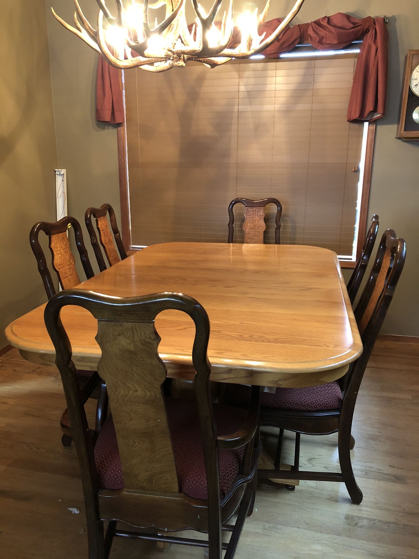 Oak dining table and chairs