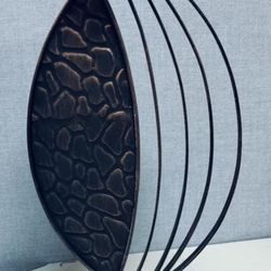 Vintage style wax candle holder with iron frame pebble stone design
