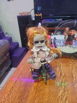  Spooky Village Animated Bicycle Doll