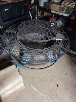 Outdoor Fire Pit with Rotating Cooking Table