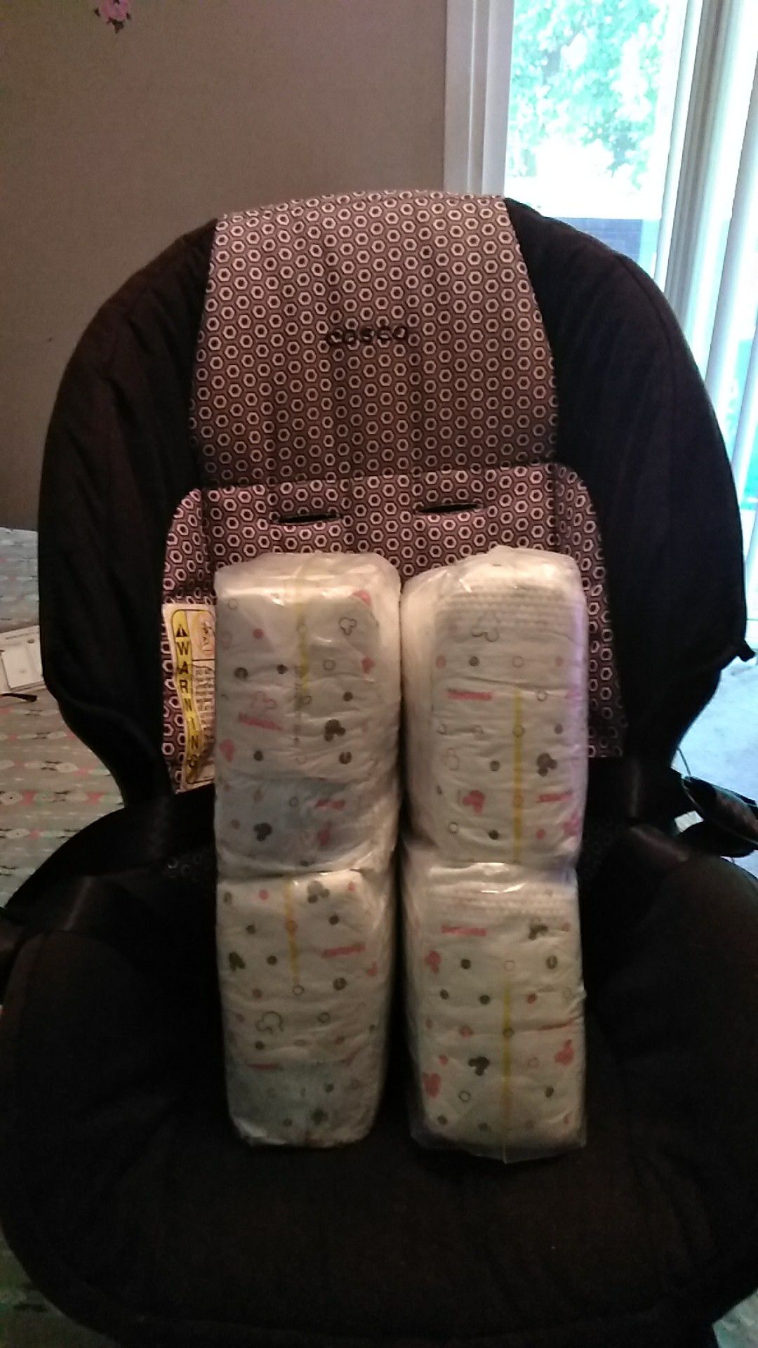 92 Huggies size 1 diapers. Cosco car seat (for 35lb. child)