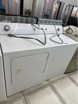 Whirlpool top load washer and electric dryer set