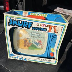 Flying Smurfs Musical Toy TV Ohio Art Wind Up Scrolling Music Chimes Vtg 1982