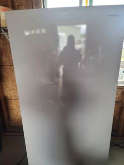 Garage freezer 32"W 6' H 3 years old and good working condition