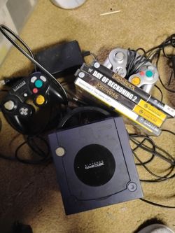 Nintendo game cube 4 games 2 controllers