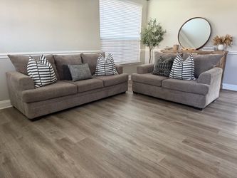 Gray sofa and loveseat set
