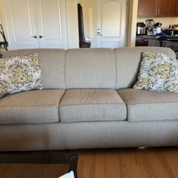 Beige Sofa with Built-In Air Mattress Bed – Great Condition