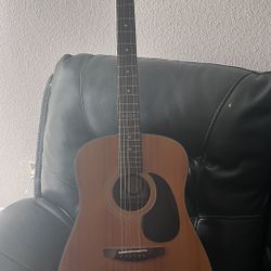 2 guitars 12 string and 6 string 