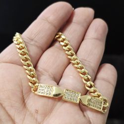 Esclava cz corazon en acero laminado en oro 18k.  Stainless steel and 18k gold plated 