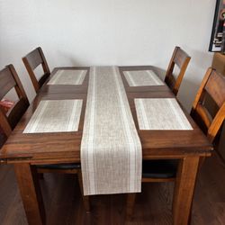 Beautiful Hard Wood Table and Chairs 