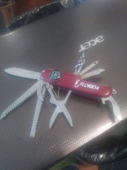 CAMPING TOOL WITH COMPASS