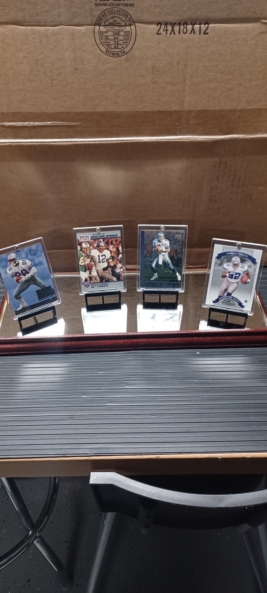 DALLAS COWBOYS SET OF 4 FOOTBALL CARDS 1990'S WITH DISPLAY STAND