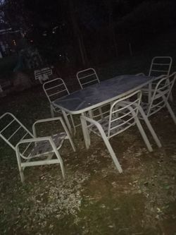 Patio table and 6 chairs