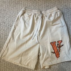 Cream and orange Vlone shorts