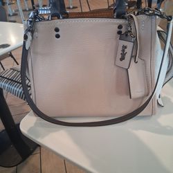 COACH ROGUE 25 $120