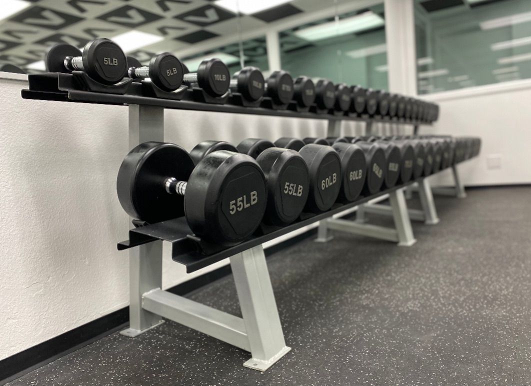 NEW & USED 5-50lb set (5lb increments) Dumbells only,STAND NOT Included