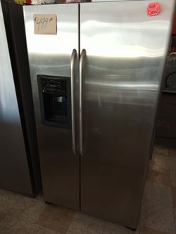 GE side by side Refrigerator Stainless works great excellent .Warranty . Delivery available . 2203 Fowler st. Ft. Myers 33901