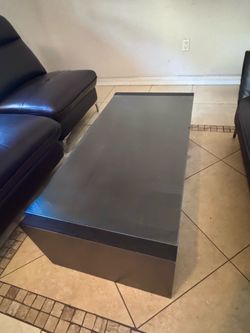 Modern black coffee table in excellent condition.