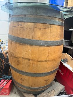 Wine barrel with circular glass table top