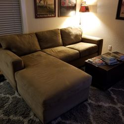 Tan Section With Pull Out Bed 